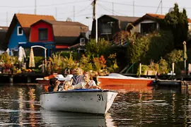 Family on a boat on the Old Danube