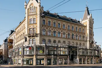 The Margaretenhof, a multi-story private residential building in the late historicist style from 1884/85 with a brick facade and towers.