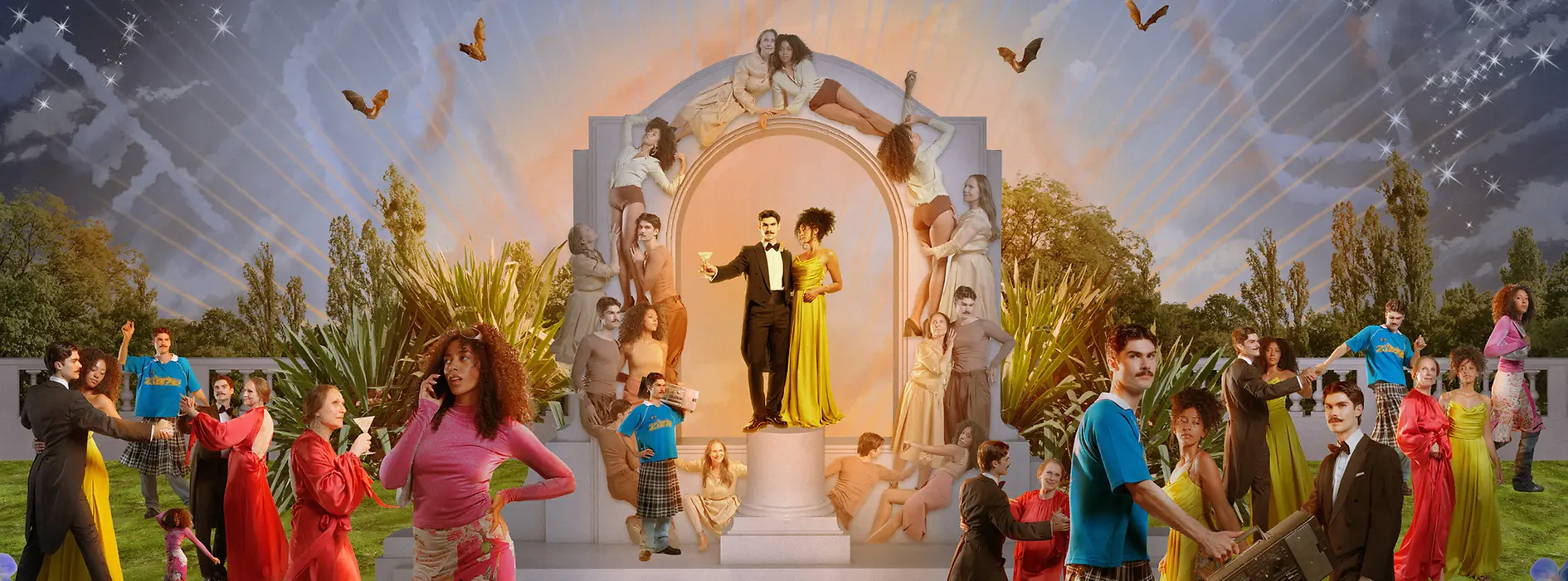 People partying in front of the Johann Strauss Monument in Vienna