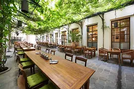 Covered tables in Klaus Prokop's guest garden
