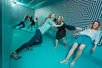 Three women in an inclined position