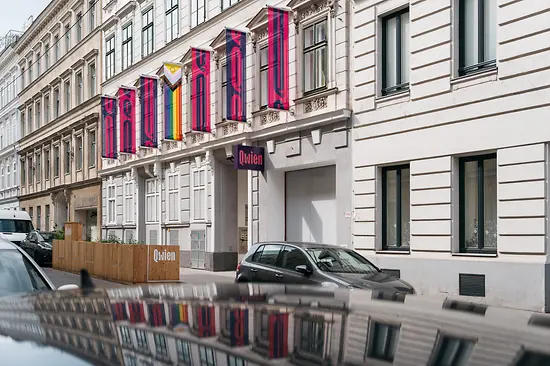 View from outside of Qwien with flags