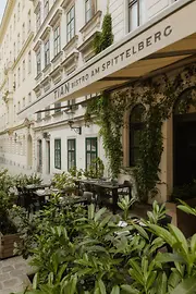Outdoor dining area at TIAN Bistro restaurant on Spittelberg